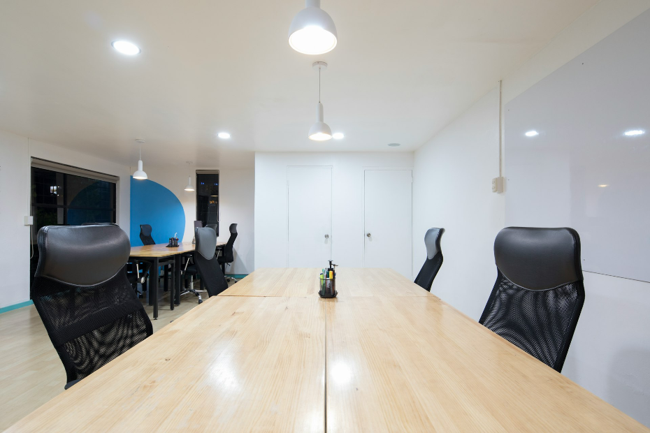 black rolling chairs and brown wooden table